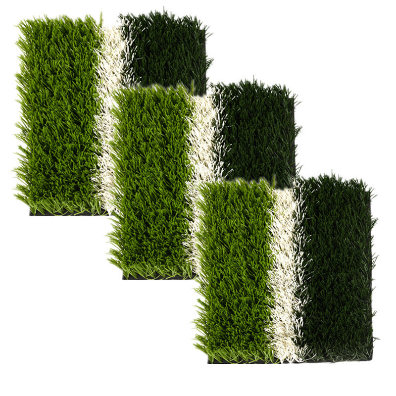 grass outside cage football field artificial turf