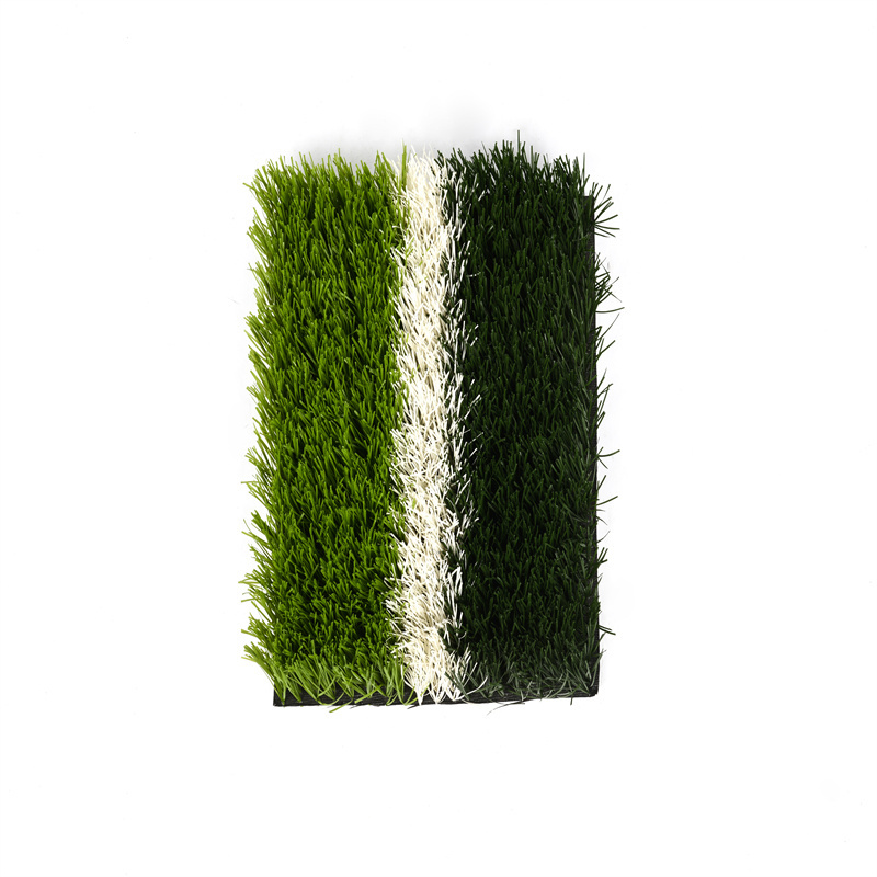 grass outside cage football field artificial turf