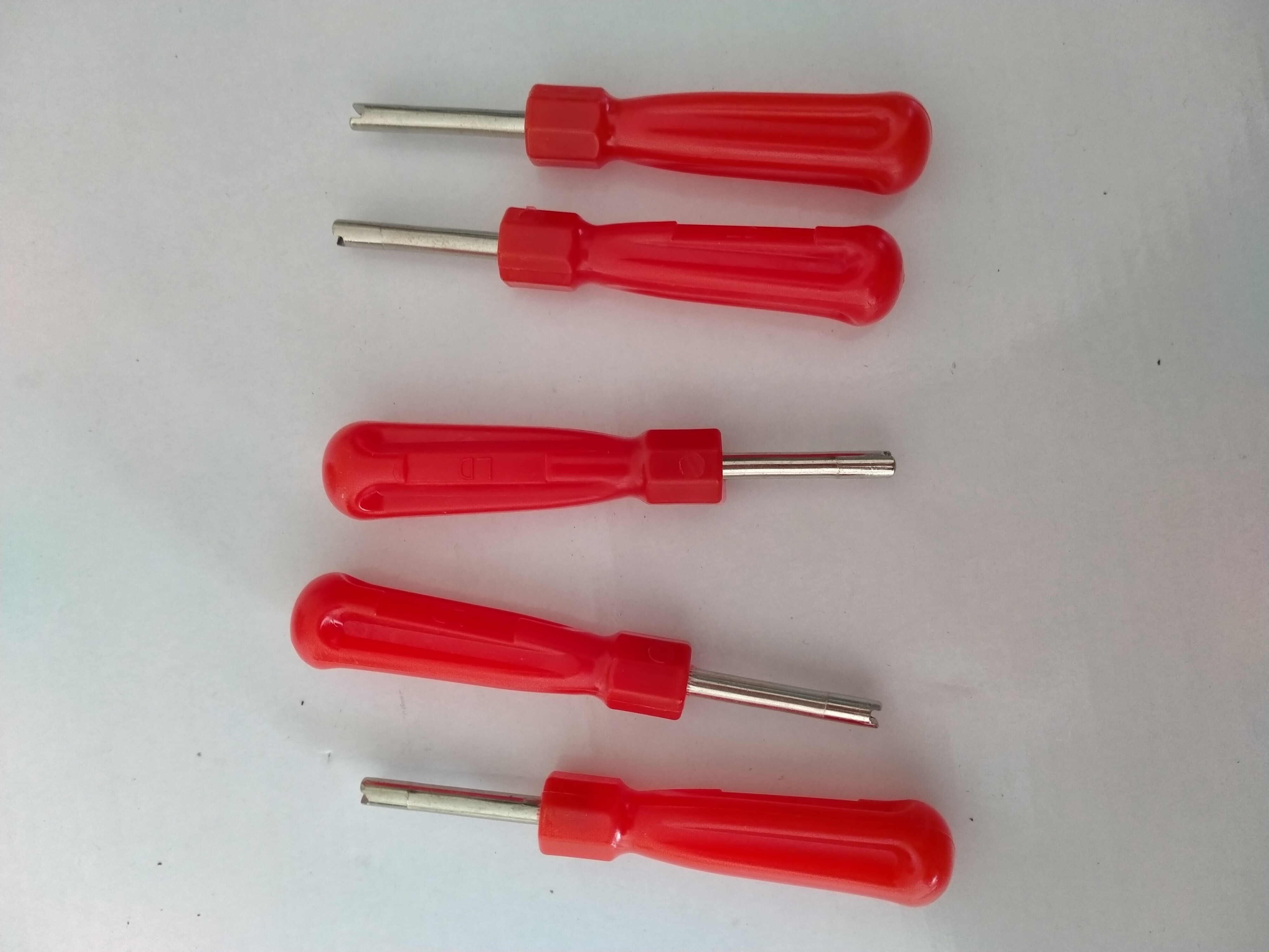 Tire repair tools with tire valve core remover tools