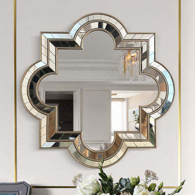 Modern bedroom wall decorated with unique and exquisite irregular oval mirror