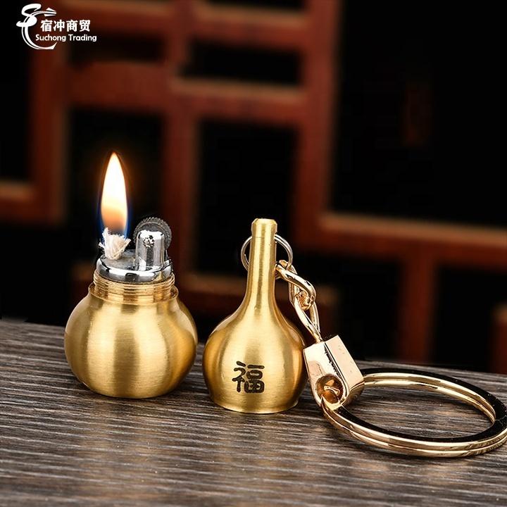 2023 New Cool Mini Custom Logo Gold Metal Brass Keychain Oil Kerosene Nunchakus  Cigarette Lighter