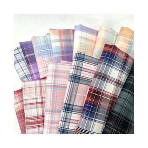 Professional wholesale soft woven yarn dyed check plaid shirt fabric polyester check jacquard fabric for bed sheets