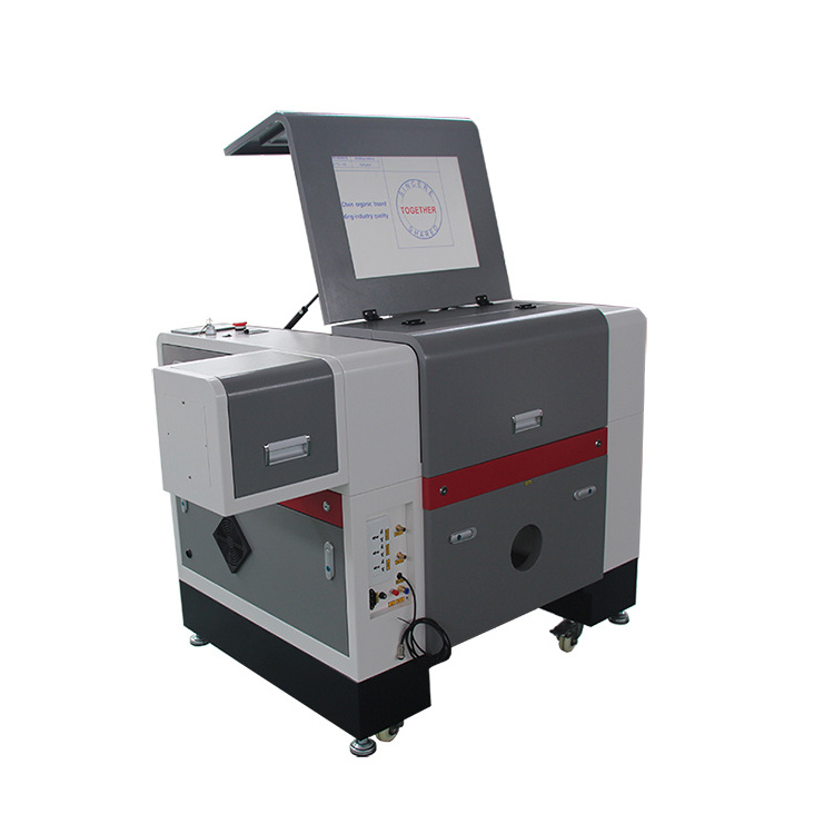 China Small home cnc 50w co2 laser engraving and cutting machine/desktop laser engraver 6040