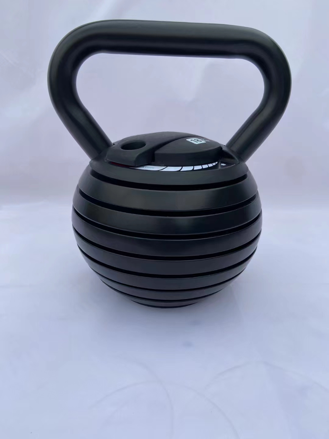 Adjustable Cast Iron kettlebell with 7 weight levels from 10-40 lbs