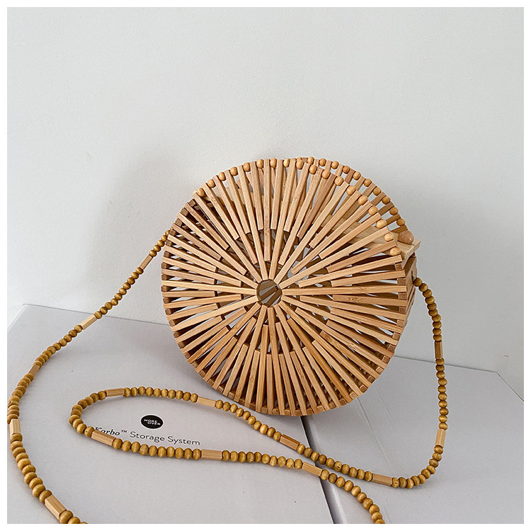 Popular Wholesale Summer Natural Eco Handmade Hollow Elegant Women Beach Tote Bag 2022 Hot Sale Handmade Bamboo Half Moon Bag