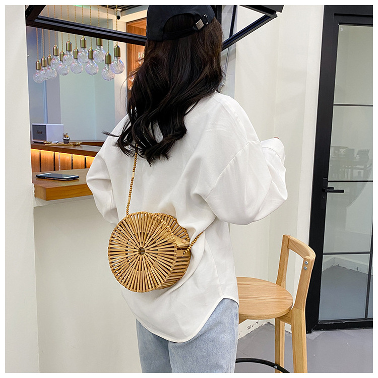 Popular Wholesale Summer Natural Eco Handmade Hollow Elegant Women Beach Tote Bag 2022 Hot Sale Handmade Bamboo Half Moon Bag