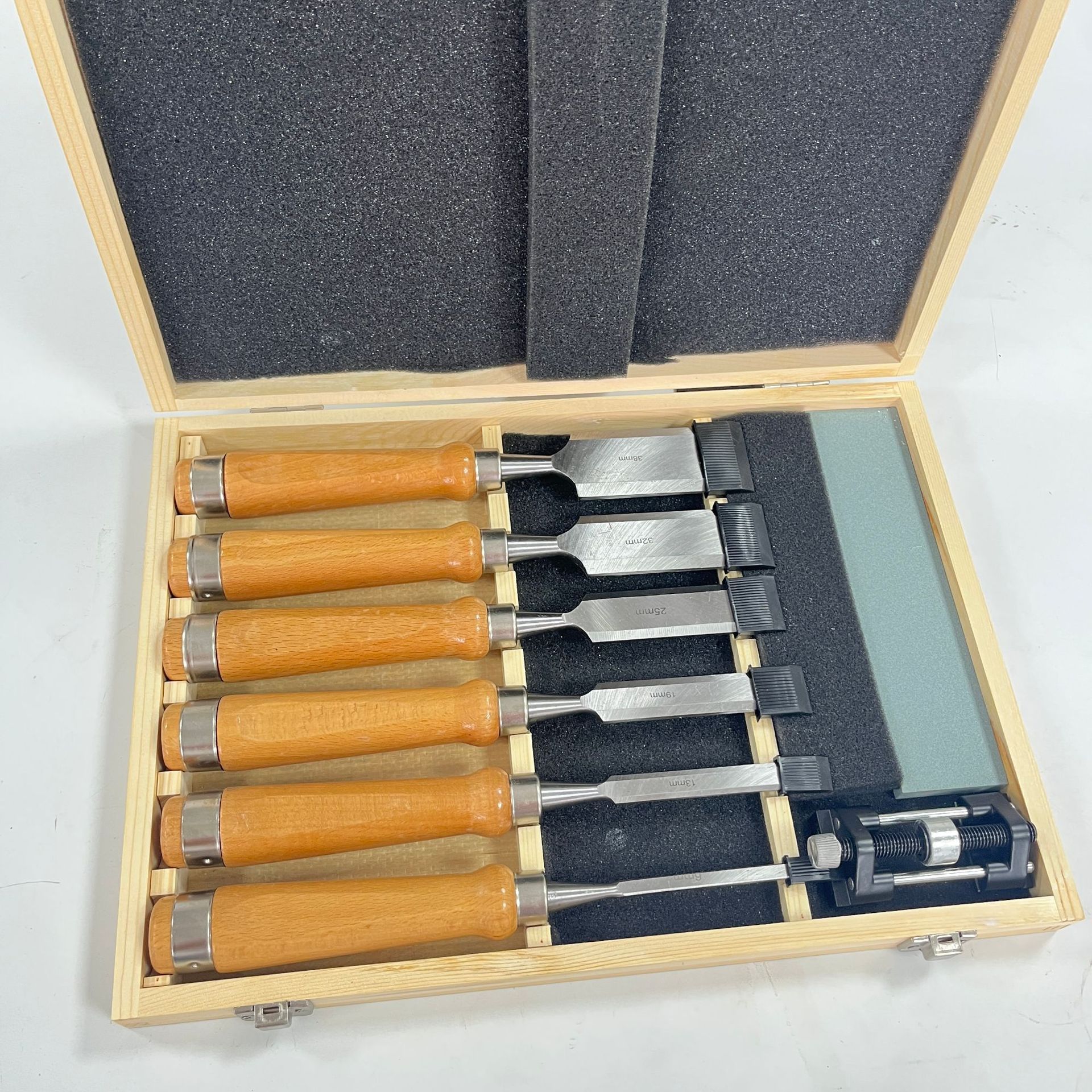 wood working chisel tool set with angle square oil stone and honing guide in wooden case