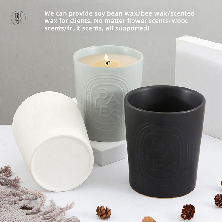 Custom wholesale matte candle vessels embossed empty candle container black ceramic candle jar with wooden lids