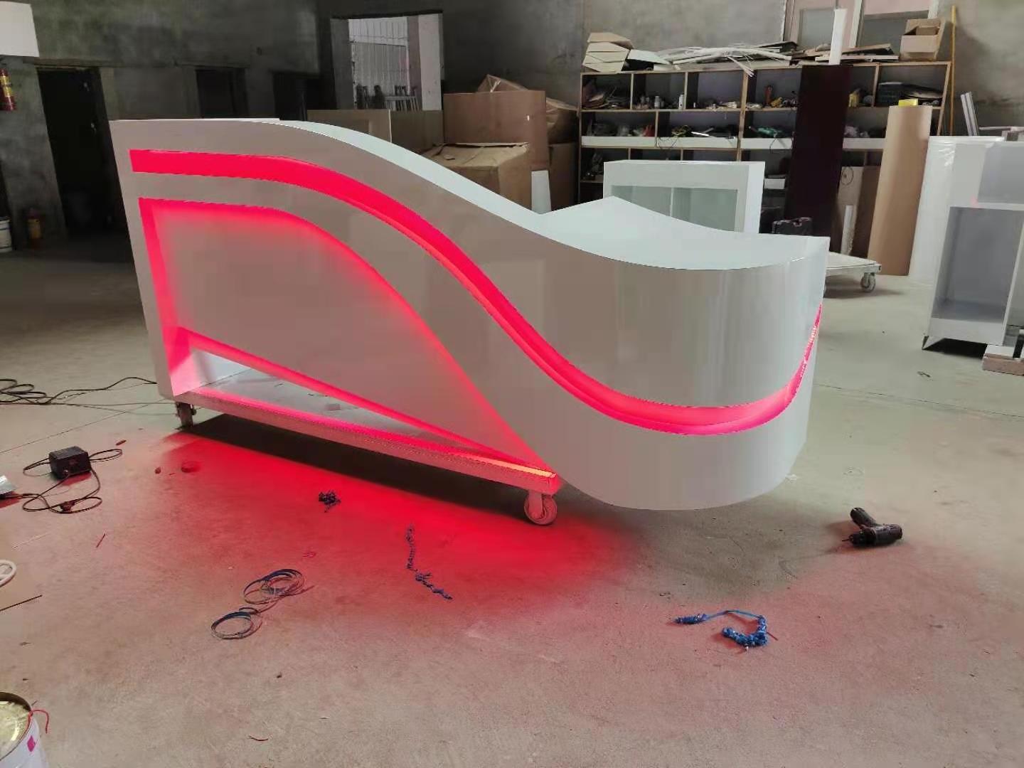 Customize white L Shape Counter Check Out Desk LED Light Curved SPA Beauty Salon  Reception Desk