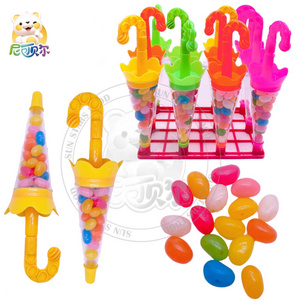 Customized wholesale halal candy cartoon umbrella shape canned fruit flavor jelly bean toy jelly candy