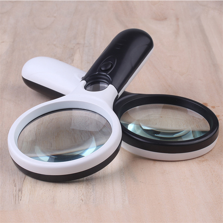 The explosive 6902AB double lens with 3 led bulb clappers holds a high power reading plastic magnifying glass with lamp