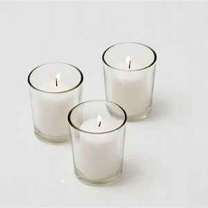 white  votive candle with clear glass jars holders