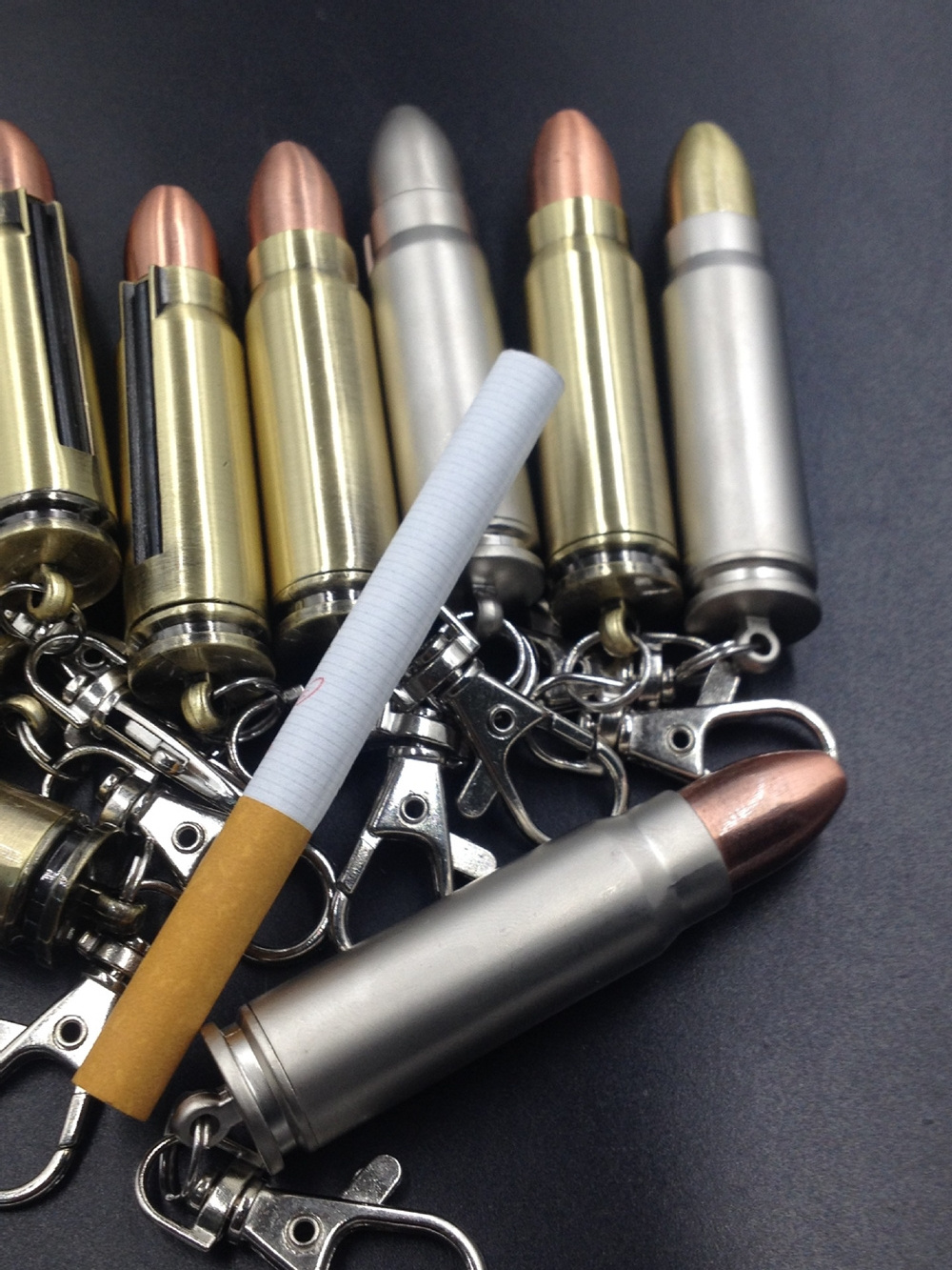 Wholesale ten thousand matches cool bullet shape flint kerosene refillable keychain lighters