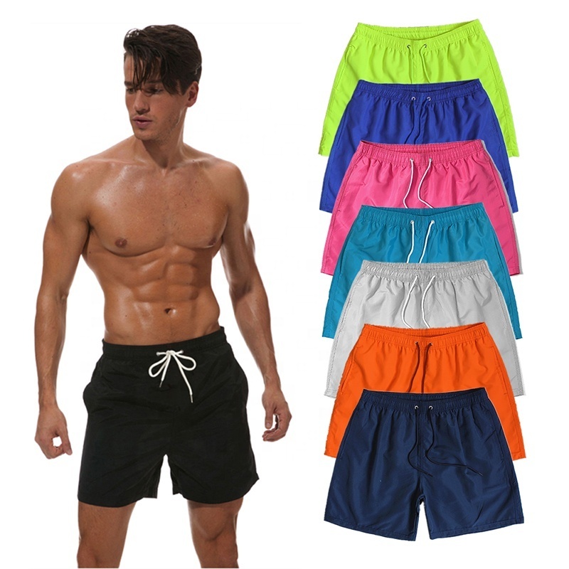 Wholesale stock beach shorts polyester men running shorts swimwear shorts for men custom logo embroidered