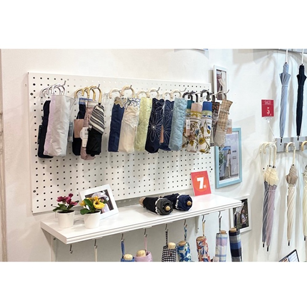 Retail shop umbrella hang pegboard organization ideas display