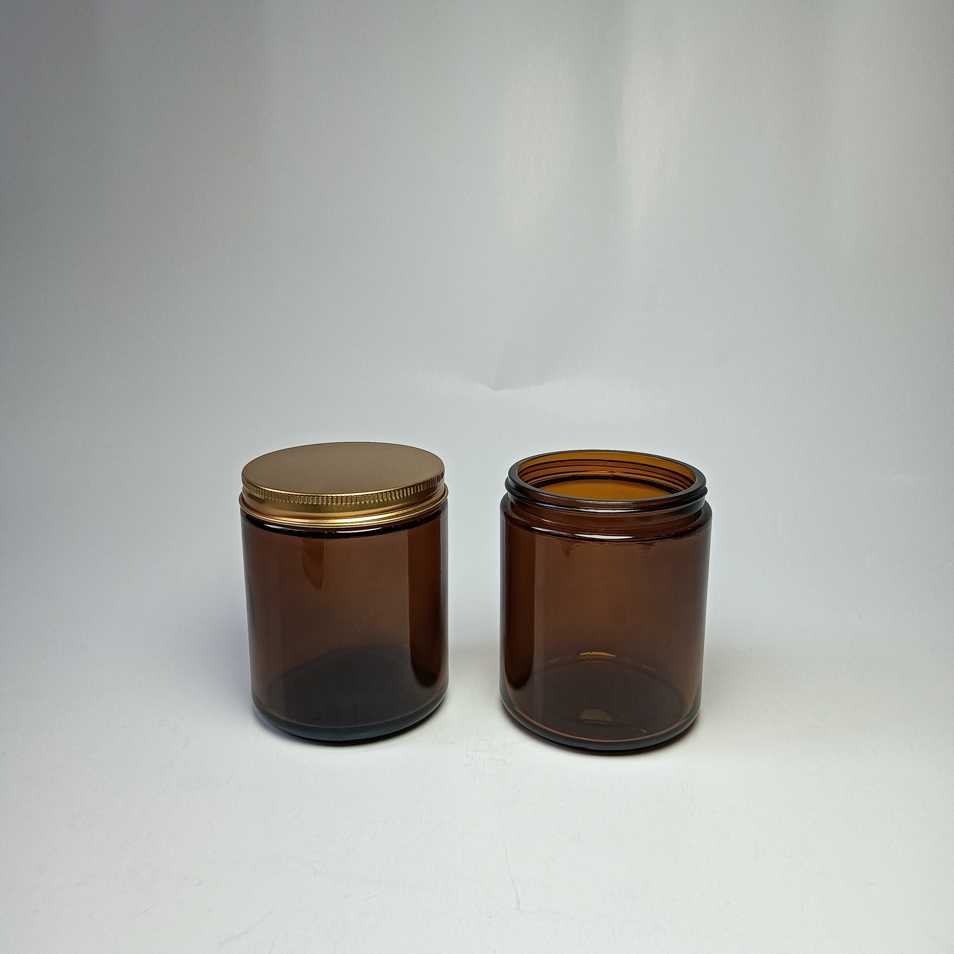 2oz 4oz 8oz hot sale clear amber glass candle jars with lids glass candle holder