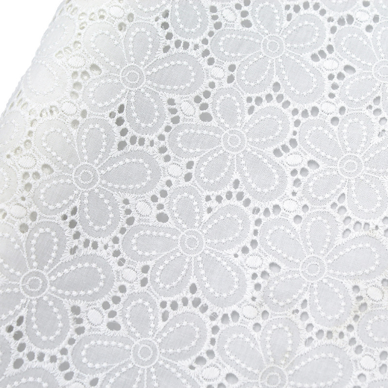 Factory wholesale Korean 140cm wide hollow-out embroidered cheap cotton lace fabric