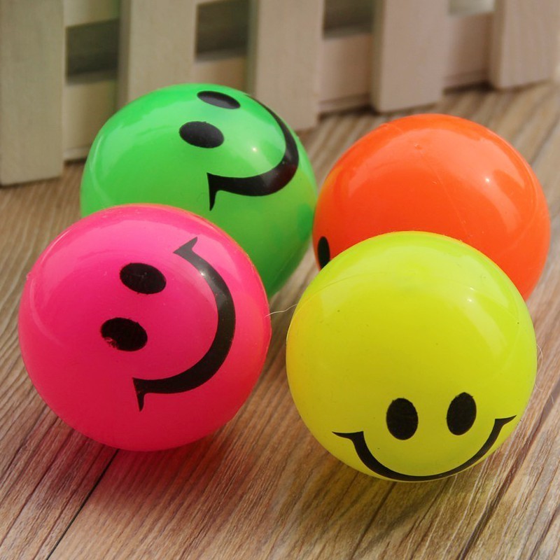 Hot Selling Wholesale Price Durable TPR Smiley Face Chew Toy Interactive Elastic Funny Flashing Indoor Outdoor Training Tools