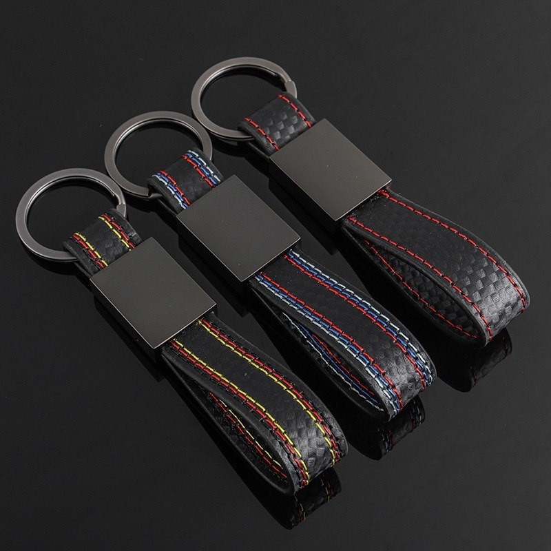 Promotional Gift Custom Embossed Logo Laser Engraving Car Keychain Keyring Carbon Fiber Leather Keychain Metal Leather Keychain