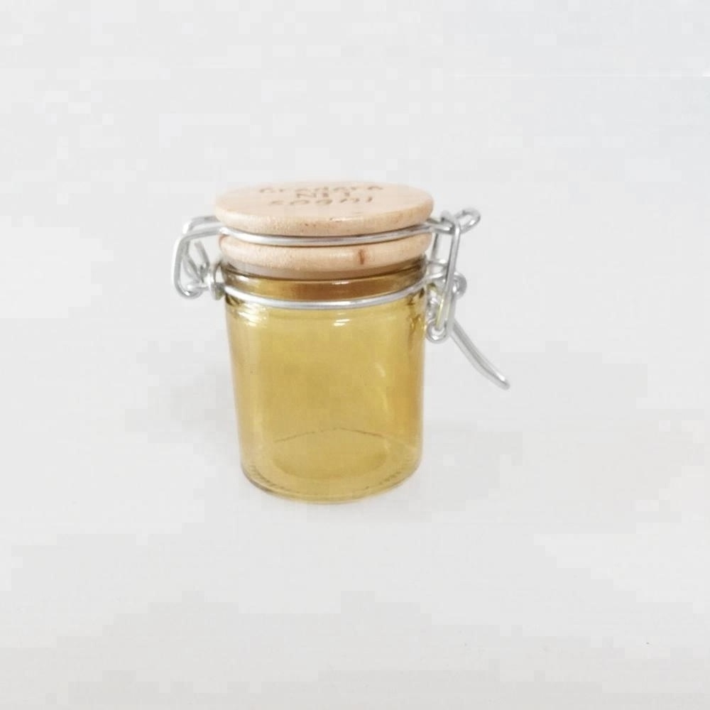 Mini 50ml Amber Color Glass Jar with Wooden Lid Printing Logo Glass Storage Jar with Swing Top