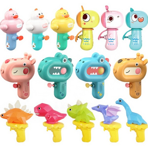 Wholesale New beach kids water play toy cartoon mini dinosaur water gun Multiple styles outdoor toys water gun