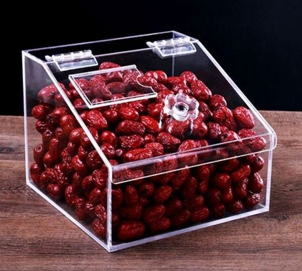 Acrylic clear candy box in supermarket