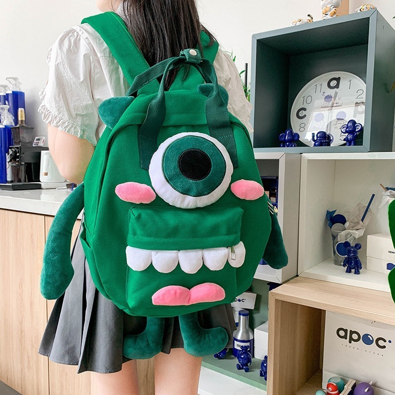 QY OEM Wholesale Cute cartoon backpack New style monster girl backpack Travel large capacity canvas bag