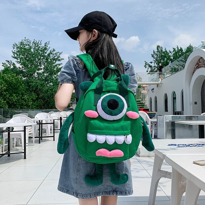 QY OEM Wholesale Cute cartoon backpack New style monster girl backpack Travel large capacity canvas bag