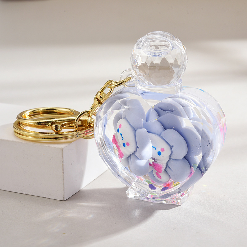 2024 new arrive acrylic keyring key chain ring oil floating cartoon creative kawaii perfume bottle quicksand toy liquid keychain