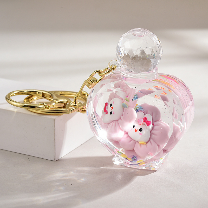 2024 new arrive acrylic keyring key chain ring oil floating cartoon creative kawaii perfume bottle quicksand toy liquid keychain