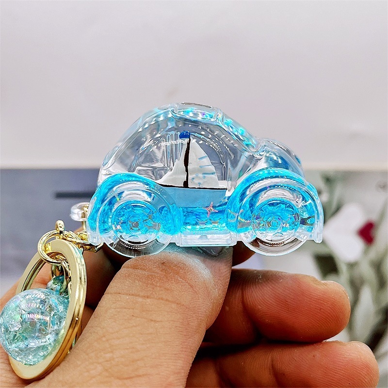 manufacturer acrylic keyring key chain ring oil floating cartoon creative Ocean sailboat quicksand liquid keychain