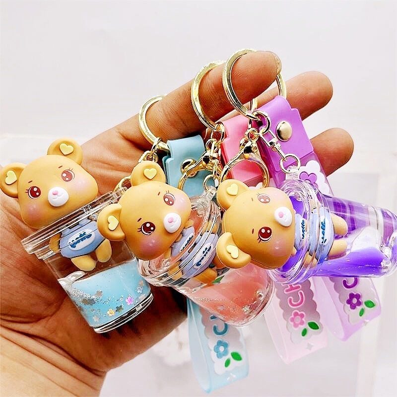 new arrive manufacturer acrylic keyring key chain ring oil floating cartoon creative quicksand milk cup bear liquid keychain