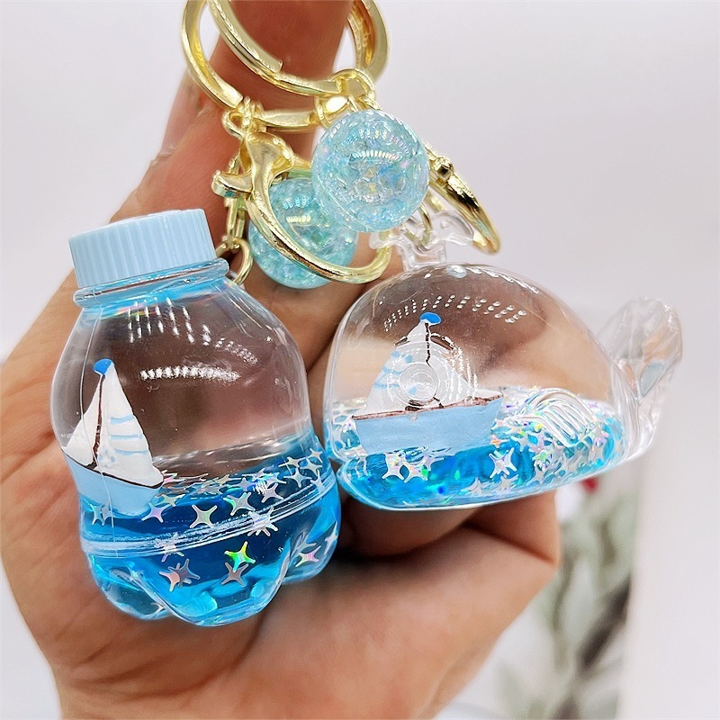 manufacturer acrylic keyring key chain ring oil floating cartoon creative Ocean sailboat quicksand liquid keychain