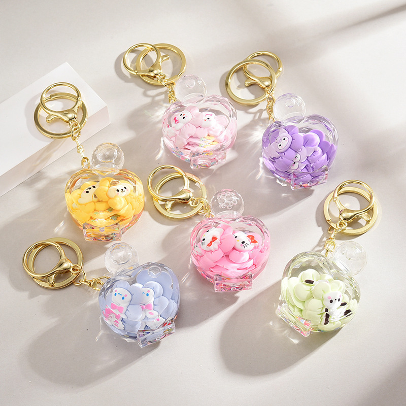 2024 new arrive acrylic keyring key chain ring oil floating cartoon creative kawaii perfume bottle quicksand toy liquid keychain