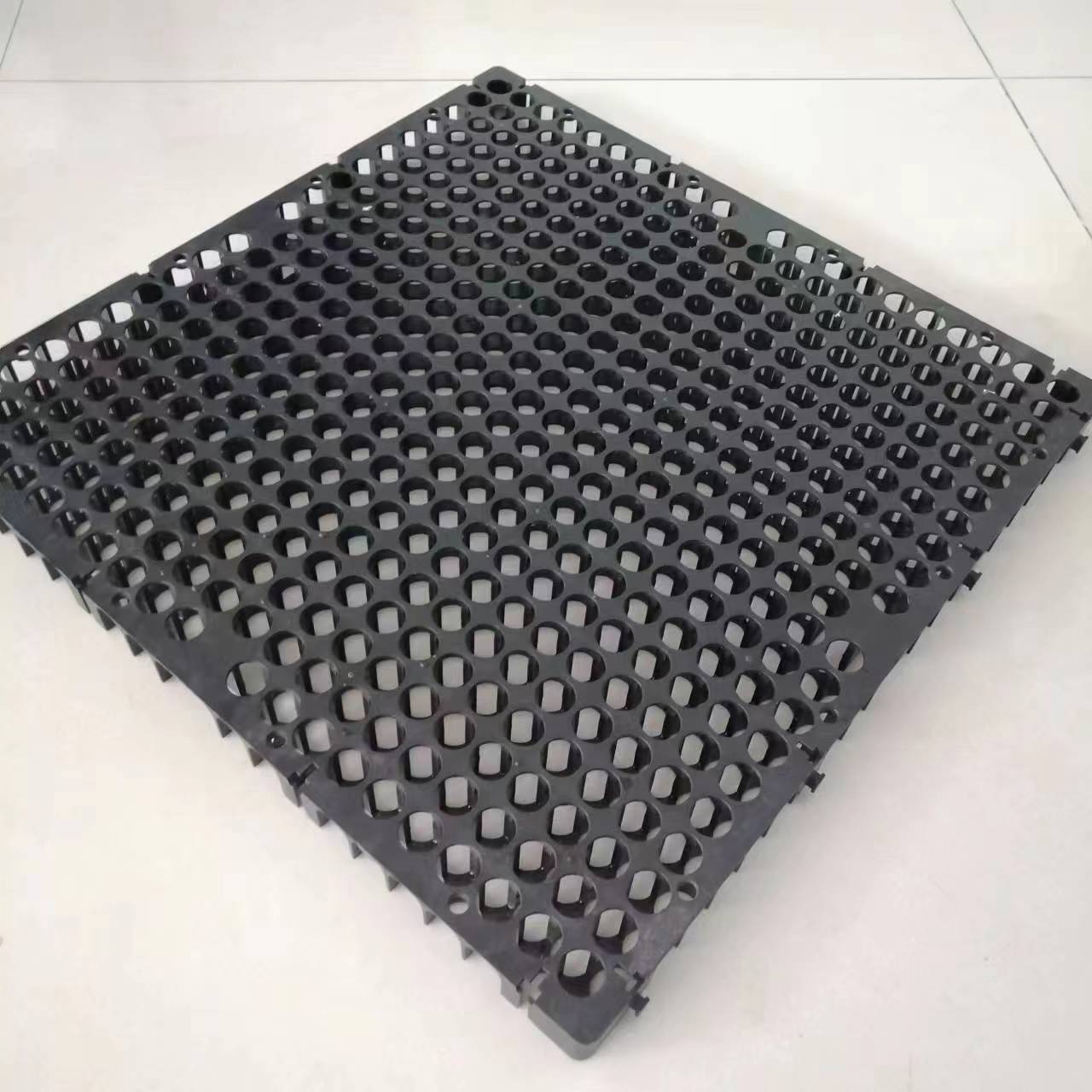 interlocking drainage grass cell gravel roadway parking lot storm infiltration geotextile drain cells