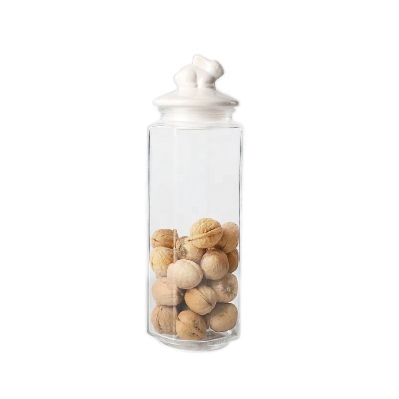 wholesale price different sizes glass candy jars with animal shape ceramic lid