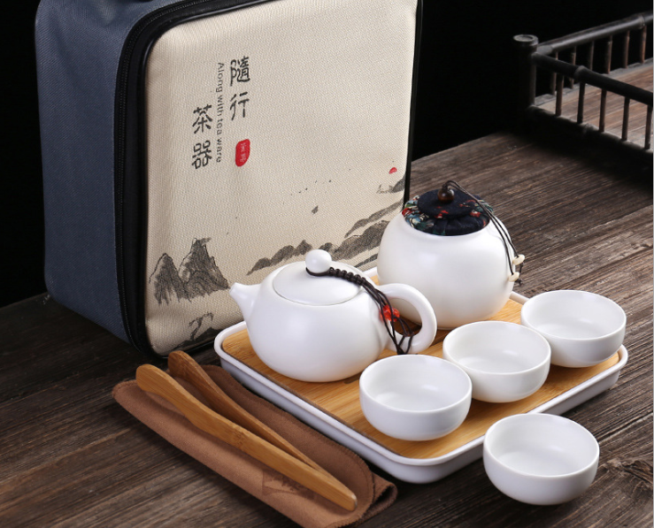 Portable ceramic travel Kung Fu storage bag gifts 4 cups two pots tray sets tea cup pot set with teapot