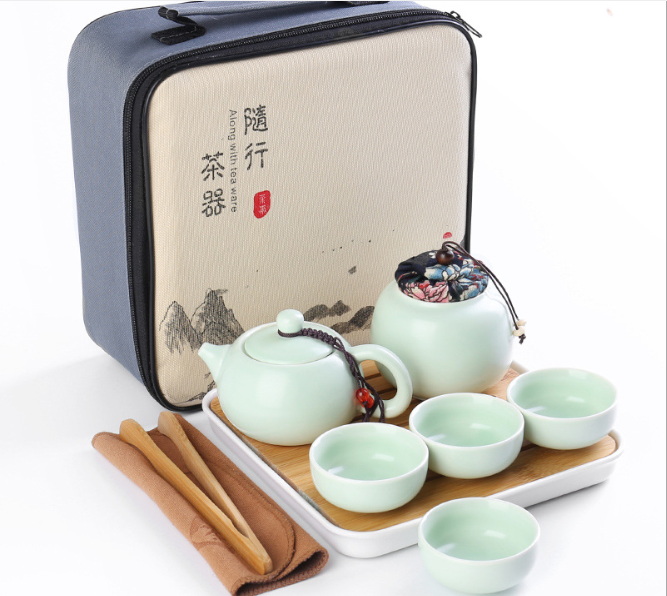 Portable ceramic travel Kung Fu storage bag gifts 4 cups two pots tray sets tea cup pot set with teapot