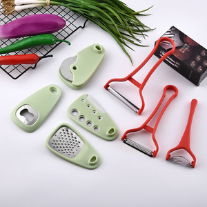 Factory wholesales stainless steel kitchen gadgets with plastic handle peeler grater can opener pizza cutter slicer garlic press