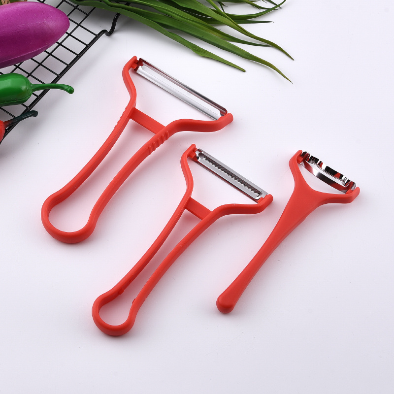 Factory wholesales stainless steel kitchen gadgets with plastic handle peeler grater can opener pizza cutter slicer garlic press