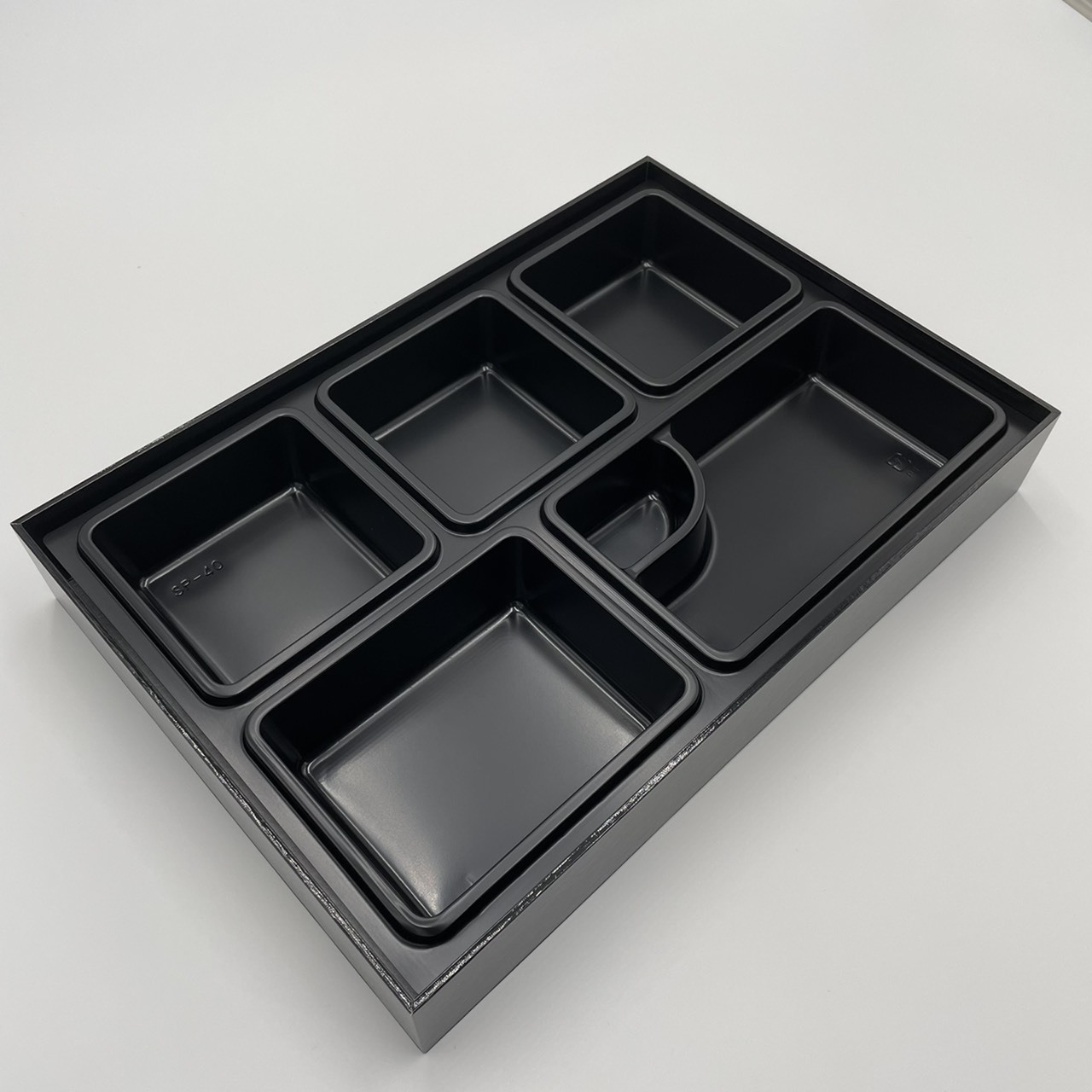 Japanese style black rectangle designer bento box take out food container delivery to go sushi restaurant