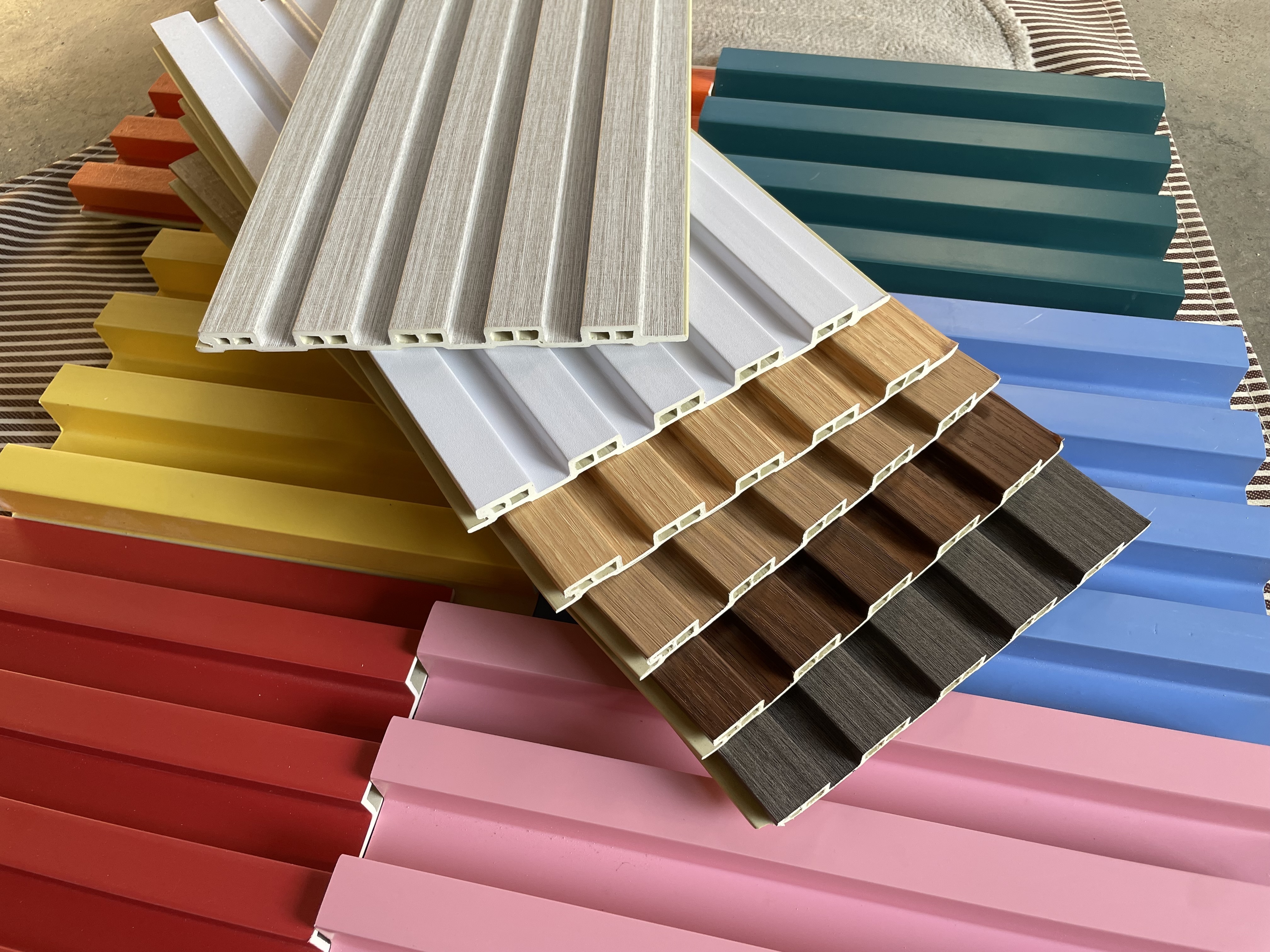 wholesale indoor fluted seamless  wave slat pvc cladding texture slat  spc wpc wall panel