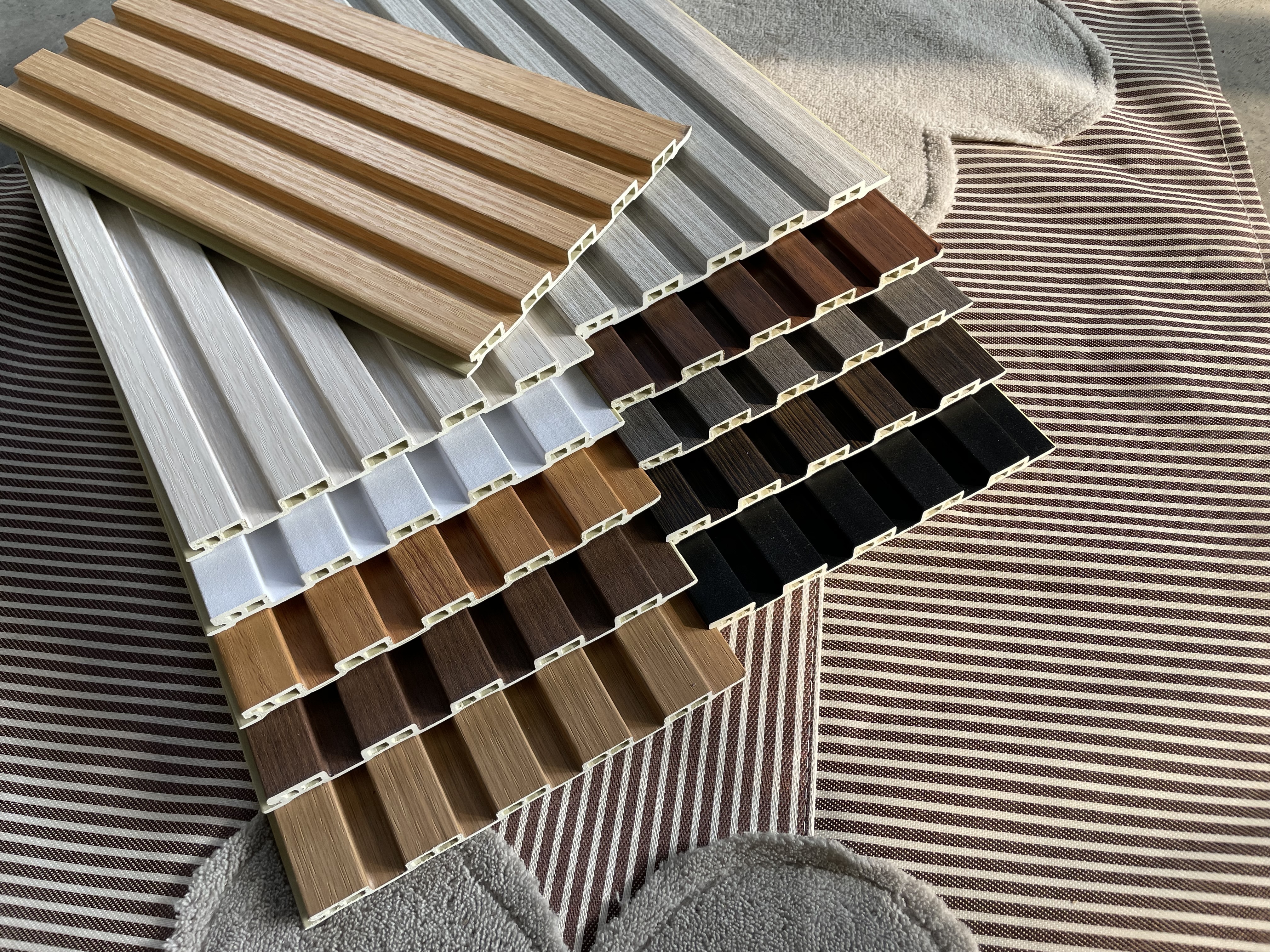 wholesale indoor fluted seamless  wave slat pvc cladding texture slat  spc wpc wall panel