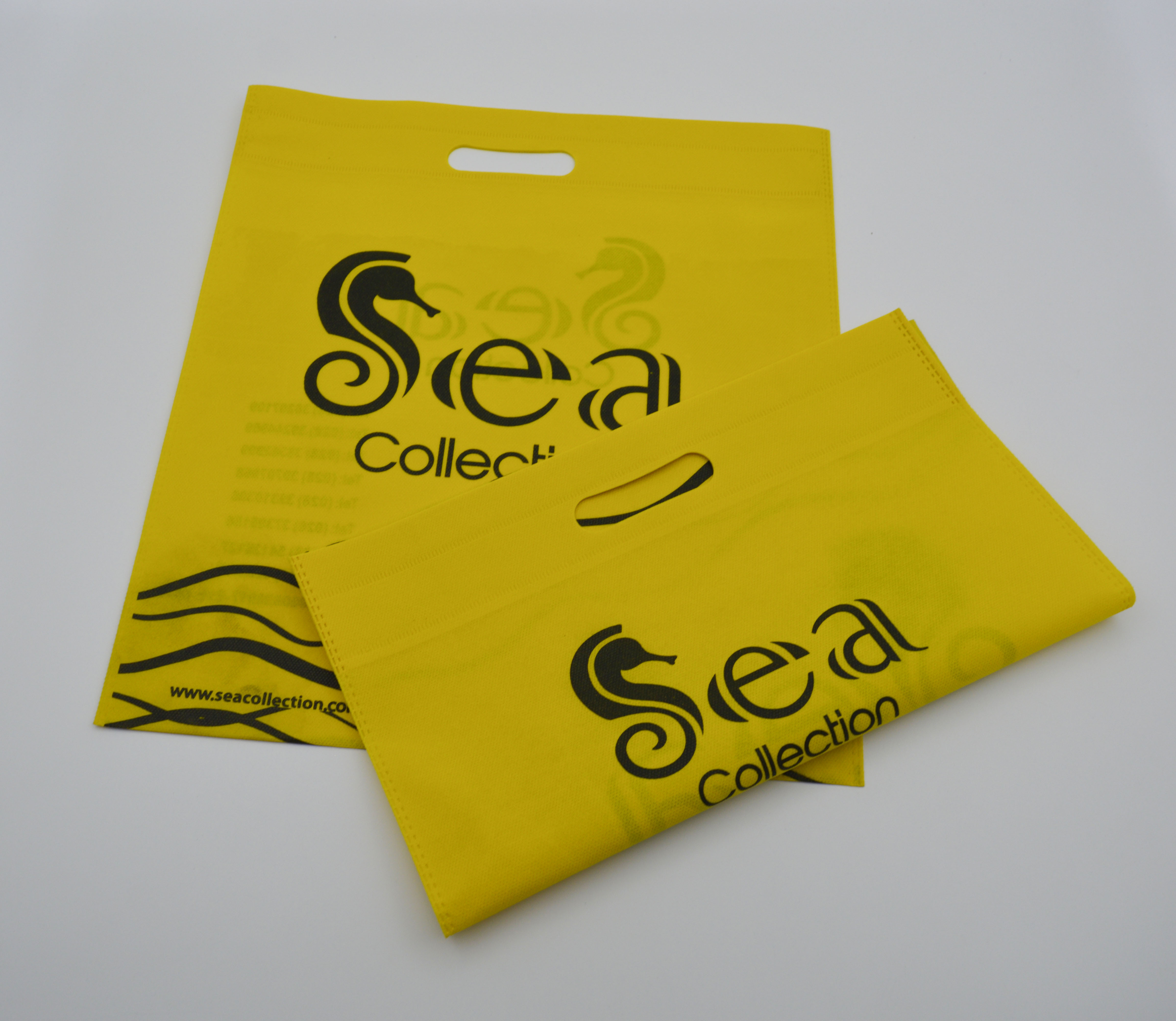 Manufacturer eco friendly degradable yellow non woven carry bag non woven die cut carry bags for shopping