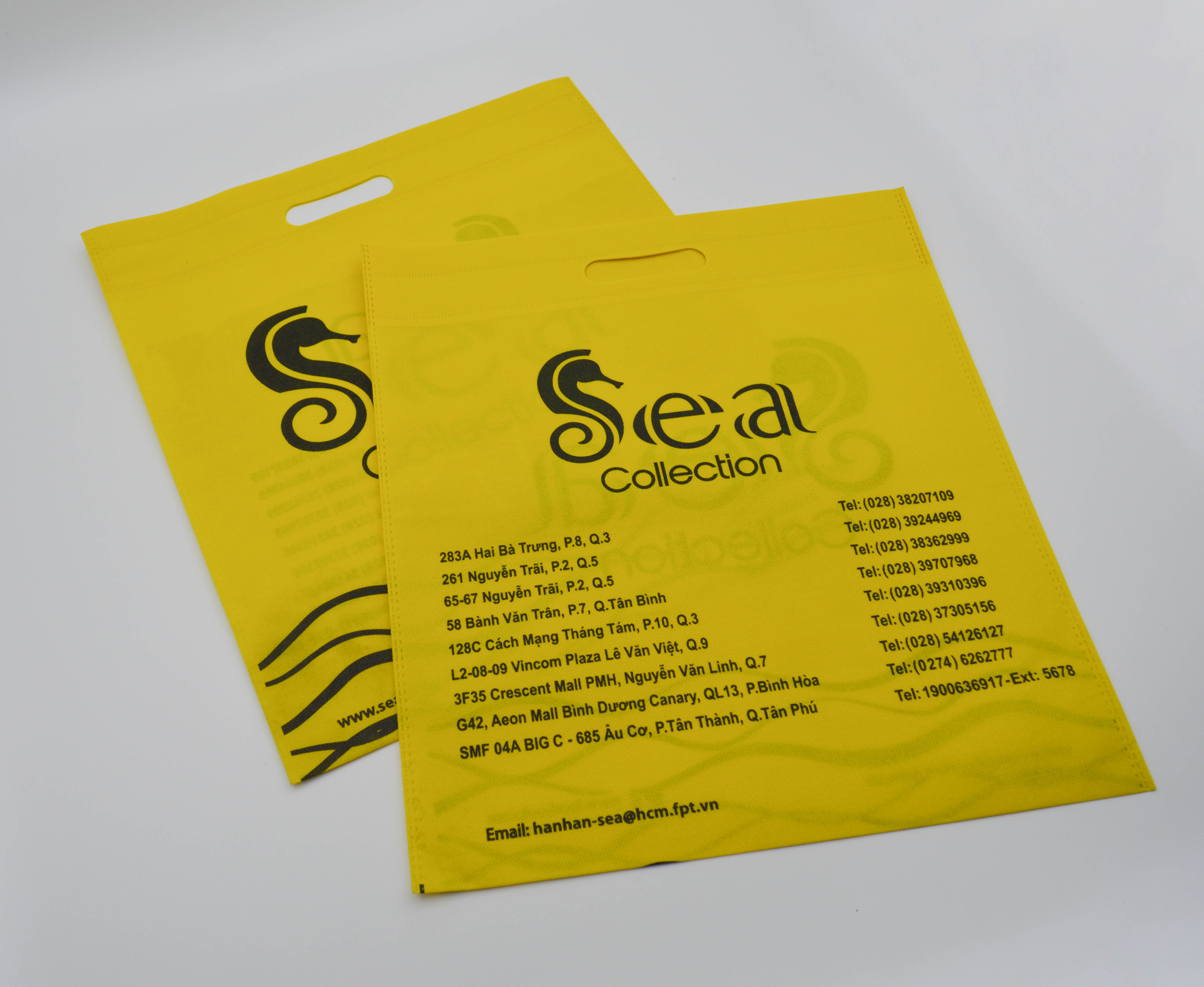 Manufacturer eco friendly degradable yellow non woven carry bag non woven die cut carry bags for shopping