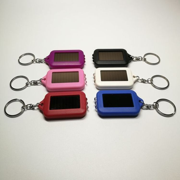 Promotion gift colorful plastic solar flash light led keychain with custom logo