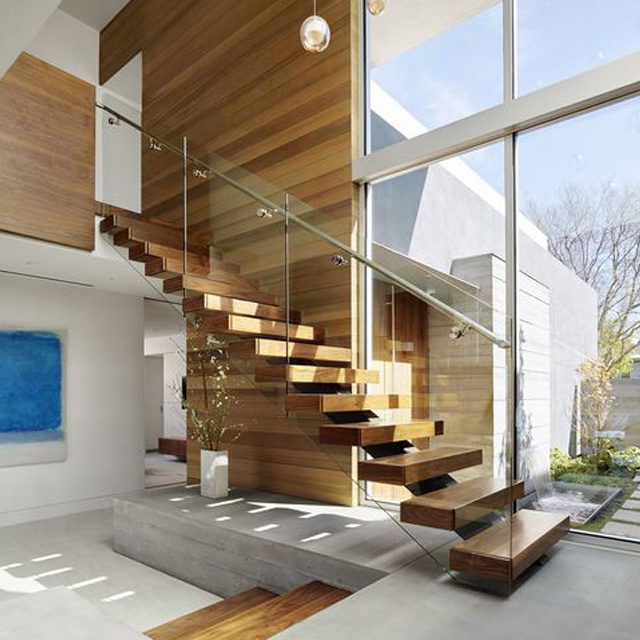 Wood floating stairs with tempered glass railing