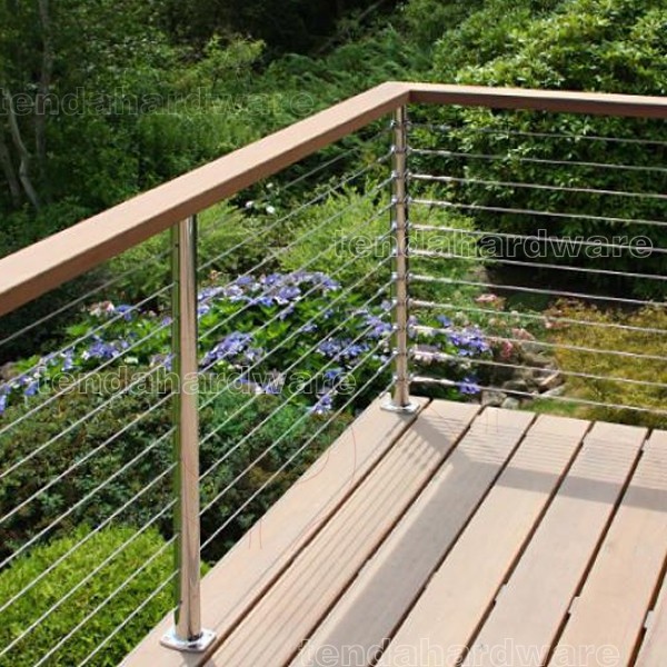 Stainless steel railings with braided aircraft cables and Milled walnut handrails