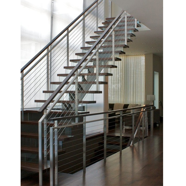 Stainless steel railings with braided aircraft cables and Milled walnut handrails