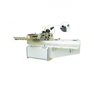 Semi auto saddle stitching and binding machine for small exercise book